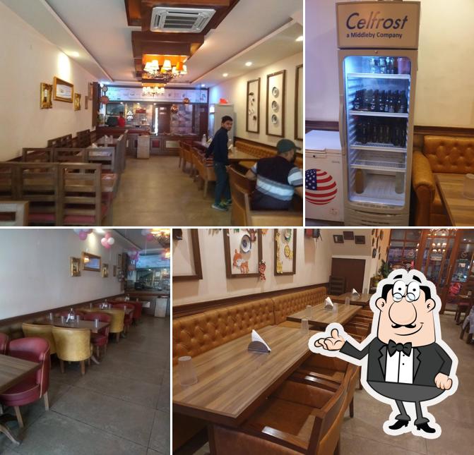 Take a seat at one of the tables at Buffet Punjab Express