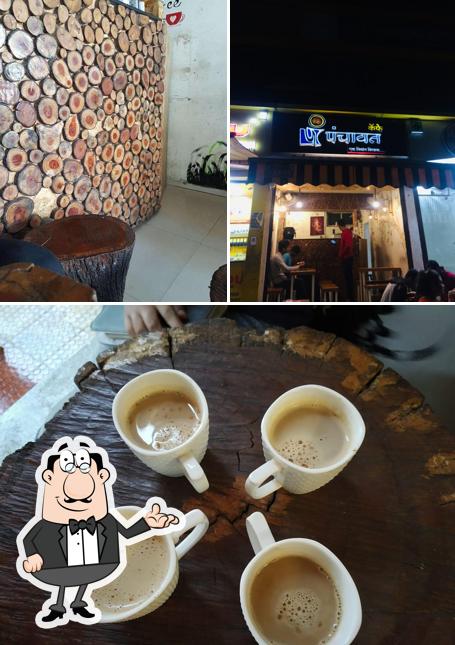 Take a look at the photo showing interior and food at Cafe Panchayat