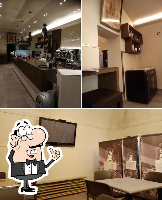 Dai un'occhiata agli interni di Caffè Garibaldi