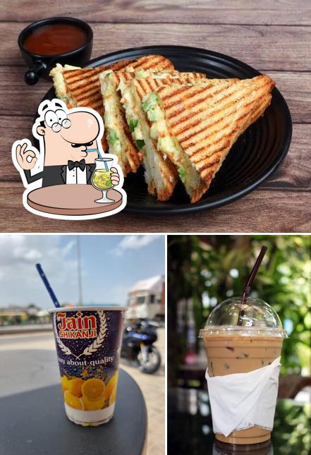 Check out the photo showing drink and sandwich at Jain shikanji