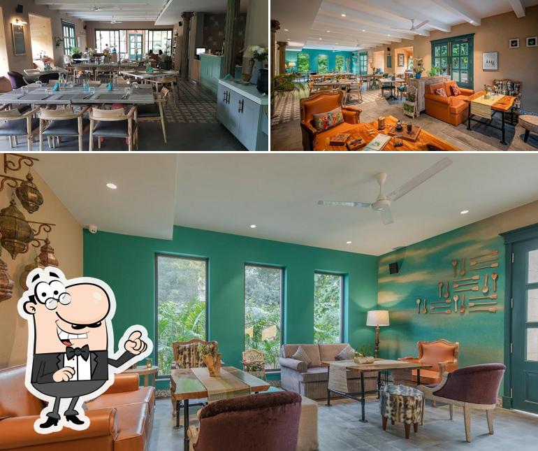 Take a seat at one of the tables at Under The Neem