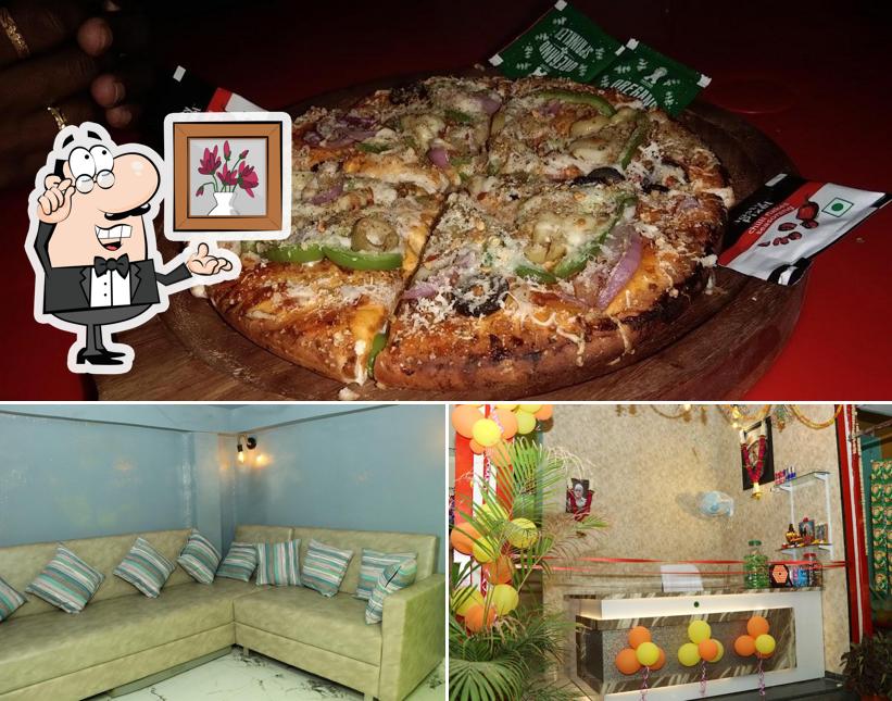 This is the image displaying interior and pizza at MJ Cafe Hub