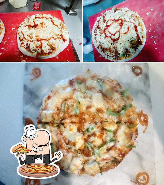 Get pizza at Ali's Briyani and Grills