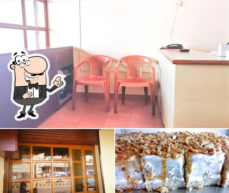 Check out the image showing interior and dessert at Bonbons Cakes & Pastries
