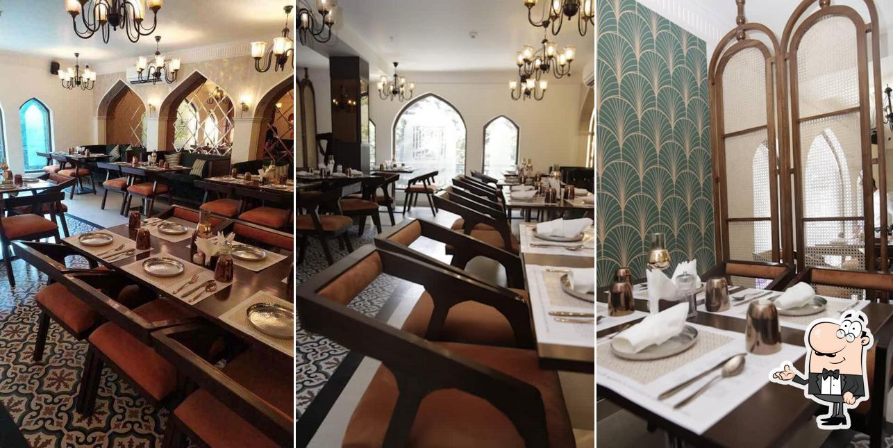 Take a seat at one of the tables at H Palate