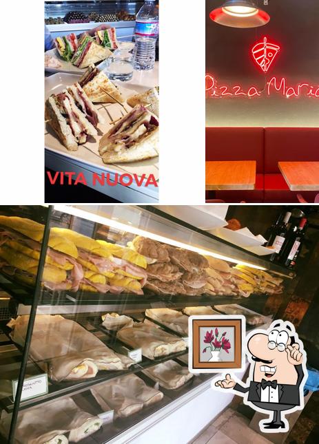Dai un'occhiata agli interni di Vita Nuova Coffee & More