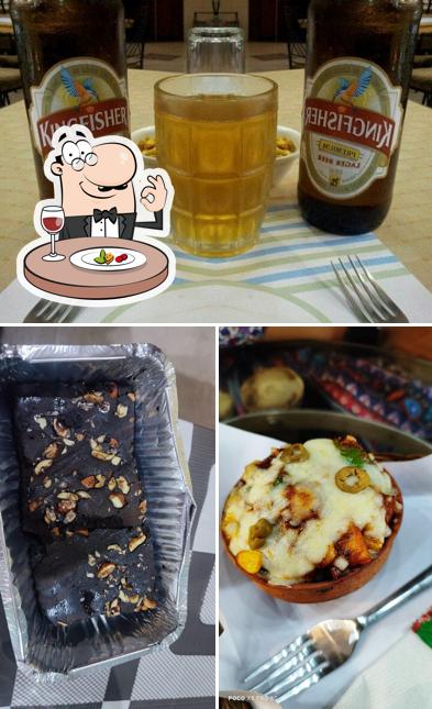 Check out the photo depicting food and beer at Airport Cafe