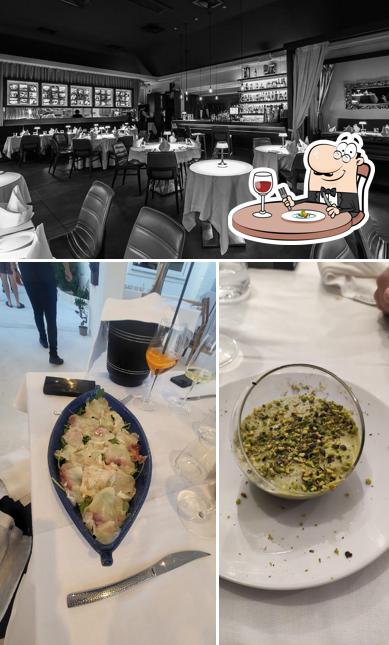 La foto della cibo e interni di L'Isola Restaurant