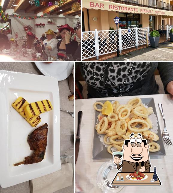 Prova i un pasto a base di carne a Pizzeria Trattoria Nettuno