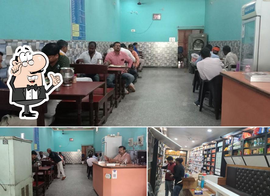 Take a seat at one of the tables at Vrindavan Restaurant