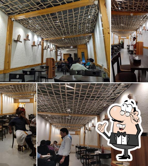 Take a seat at one of the tables at Theeram