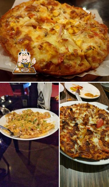 Try out pizza at Ecstasy Restaurant