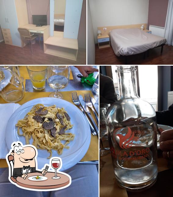 Dai un’occhiata alla foto che mostra la cibo e interni di Aquila d'Oro Hotel & Restaurant