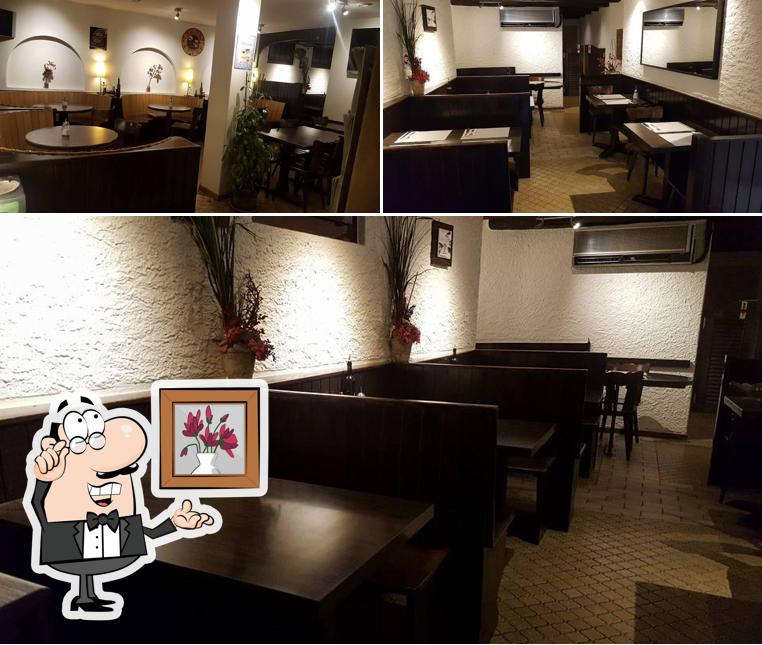 Dai un'occhiata agli interni di Restaurant-Pizzeria Tony's Bar Palumbi