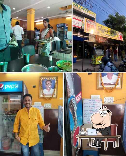 Take a seat at one of the tables at Thinnantha Bojanam (unlimited buffet)