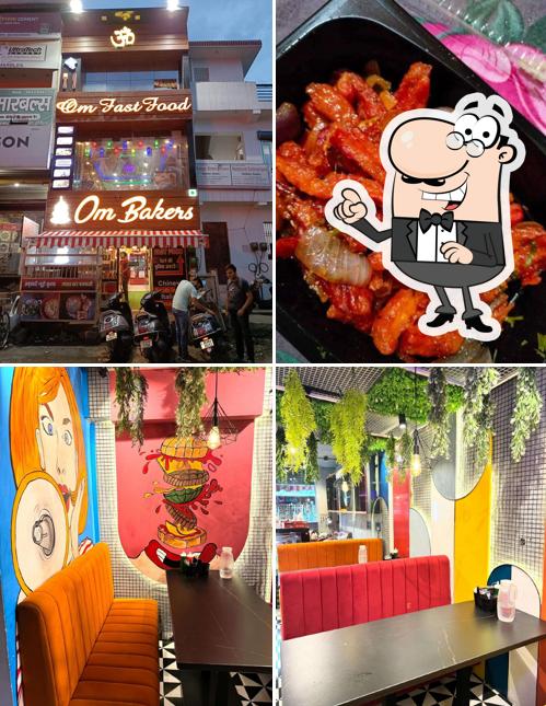 Take a seat at one of the tables at Om Fast Food