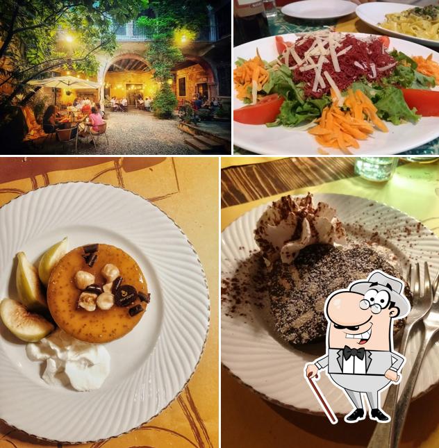 Puoi goderti l'aria fresca da seduto all'esterno di Osteria Trattoria Al Duomo