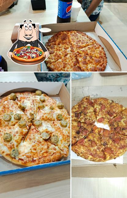 Try out pizza at Domino's Pizza Avas Vikas Colony, Hardoi