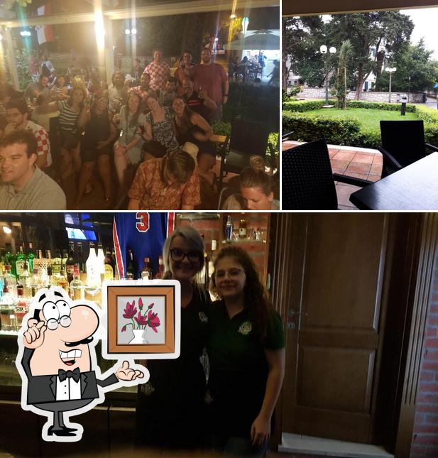 Dai un'occhiata agli interni di Sports Pub Mario
