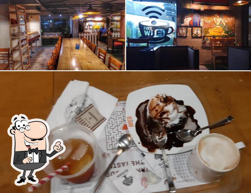 The picture of Barista Cafe Vrindavan’s interior and dessert