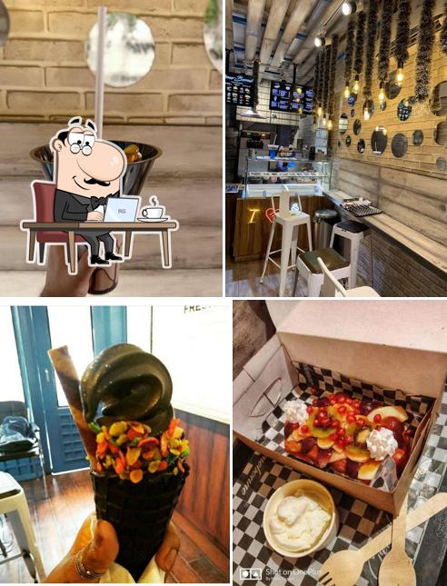 Take a seat at one of the tables at Cremeborne Ice Creams & Desserts