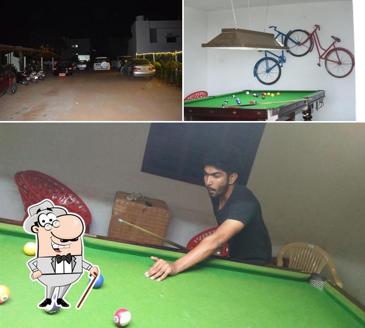 Check out the image depicting exterior and interior at Hide Out Cafe