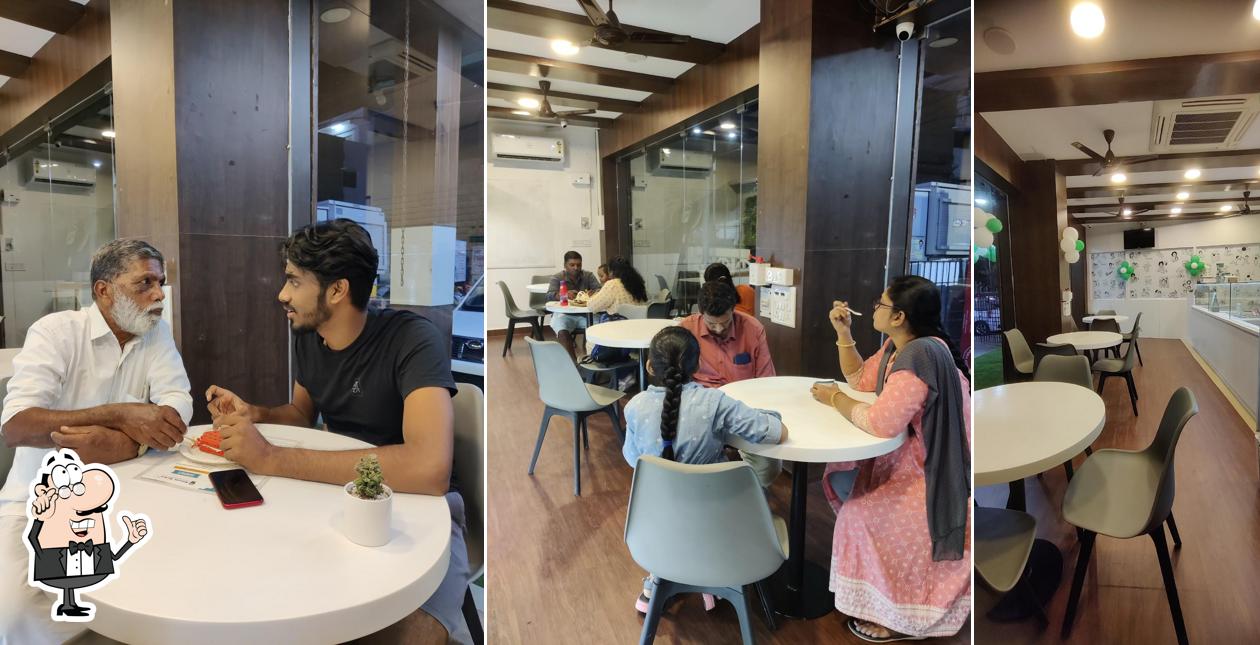 Take a seat at one of the tables at Kelvin Scale Creamery Ice Creams and Waffles