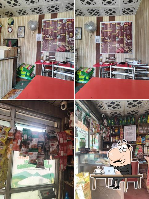 Take a seat at one of the tables at The Royale Restaurant & catering services