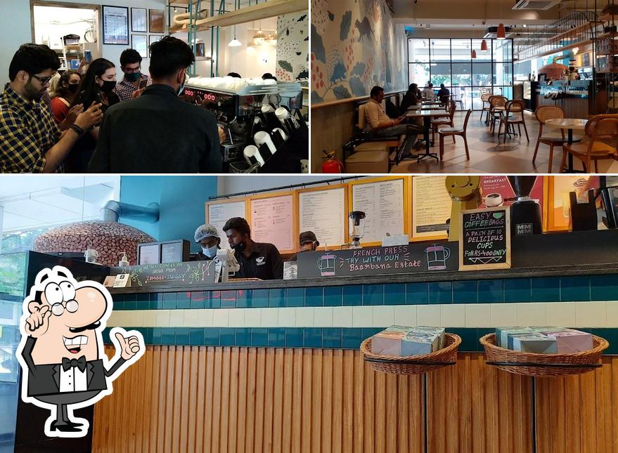 Take a seat at one of the tables at Third Wave Coffee