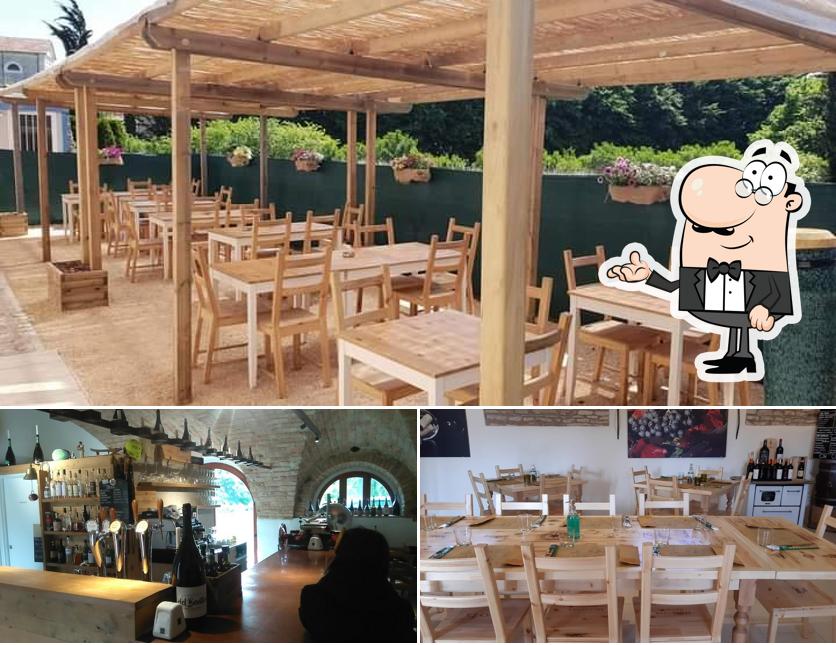 Dai un'occhiata agli interni di Osteria del bevitore