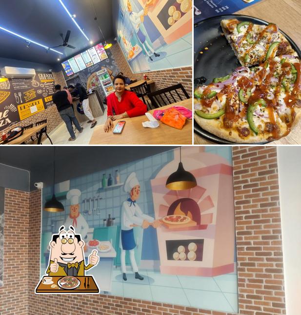 Try out pizza at The Pizza Empire Johri Enclave