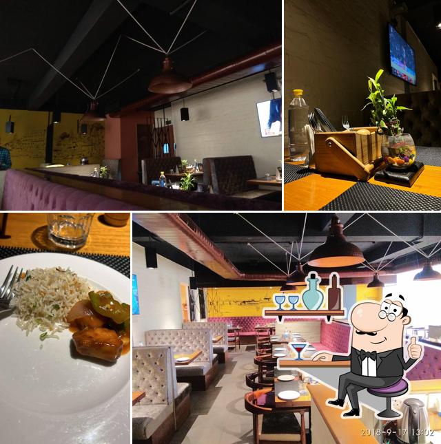 Take a seat at one of the tables at The Yellow Chilli