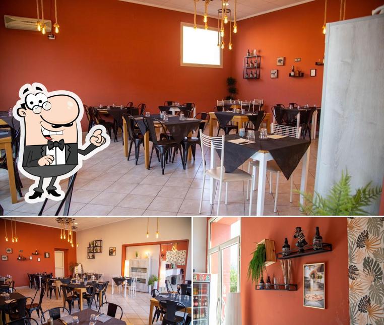 Dai un'occhiata agli interni di Pizzeria Il Covo Dei Ghiotti