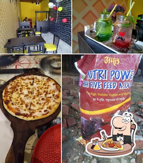 Get pizza at Twinz Cafe