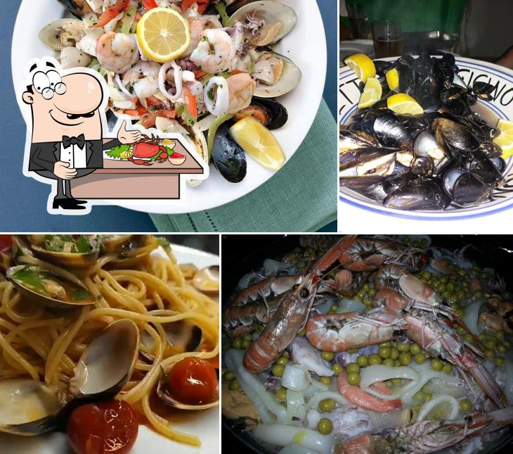 Prenditi tra i molti pasti di mare offerti a Gigino Metronotte