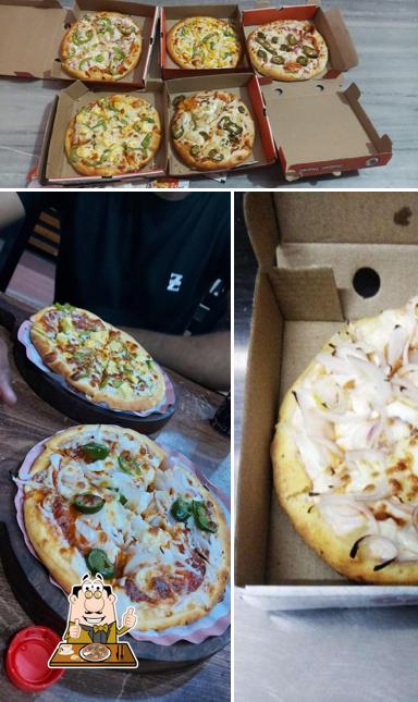 Try out pizza at Grand Pizza