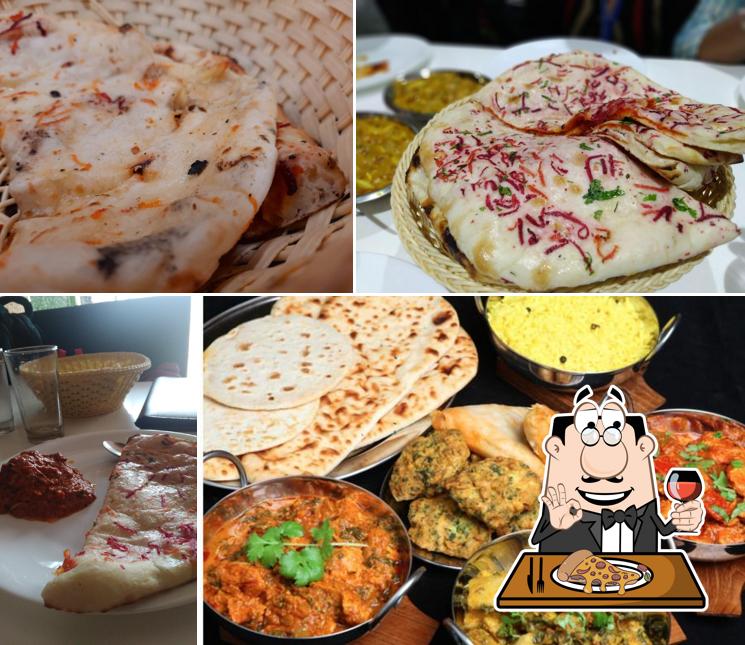 Try out pizza at আdda Inn