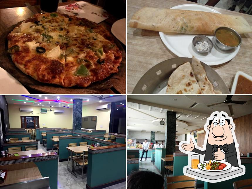 This is the photo displaying food and interior at 7 Flowers Hotel and Restaurant