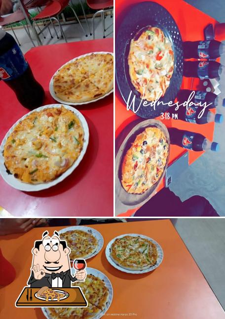 Pick pizza at PIZZA CLUB AND CAFE