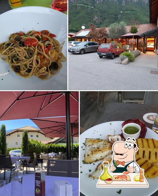 Prenditi la cucina di mare a Ristorante Pizzeria Bar Romedius