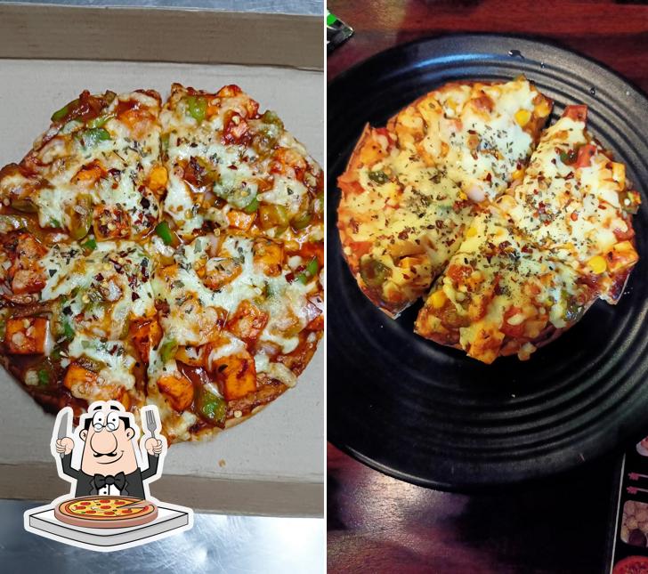 Get pizza at Swad गढ़