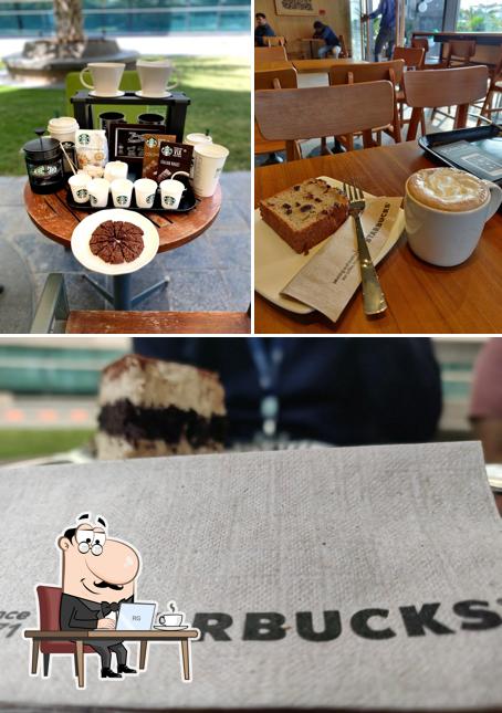 Take a seat at one of the tables at Starbucks