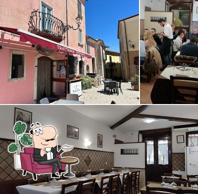 Guarda la foto che presenta la interni e tavolo da pranzo di Trattoria "Nuscana"