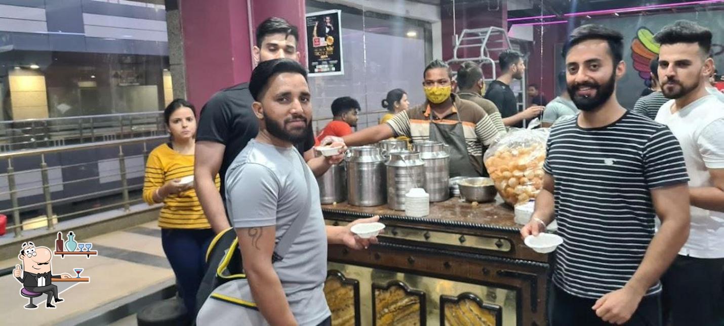 Take a seat at one of the tables at sawariya chaat shop