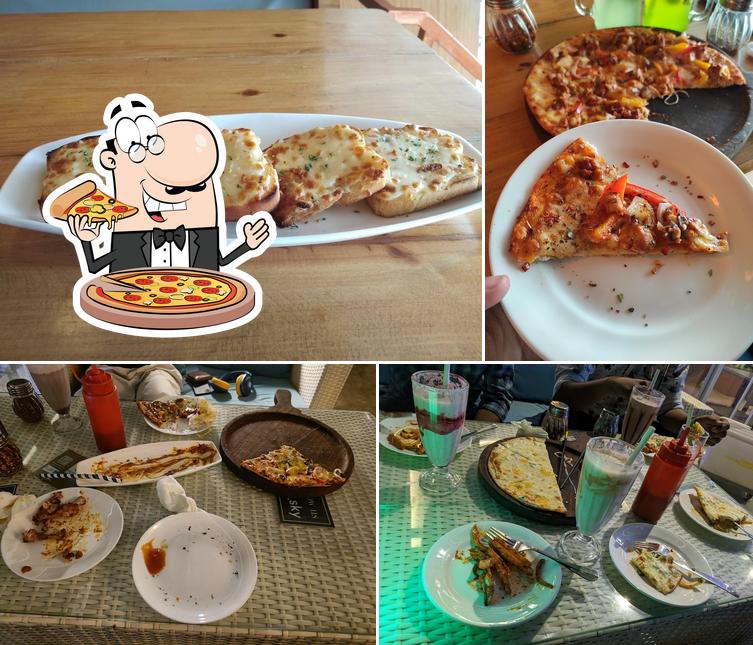 Order pizza at THE ROOF SKY RESTAURANT & CAFE