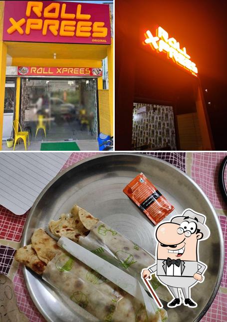 This is the image depicting exterior and food at Roll Xpress