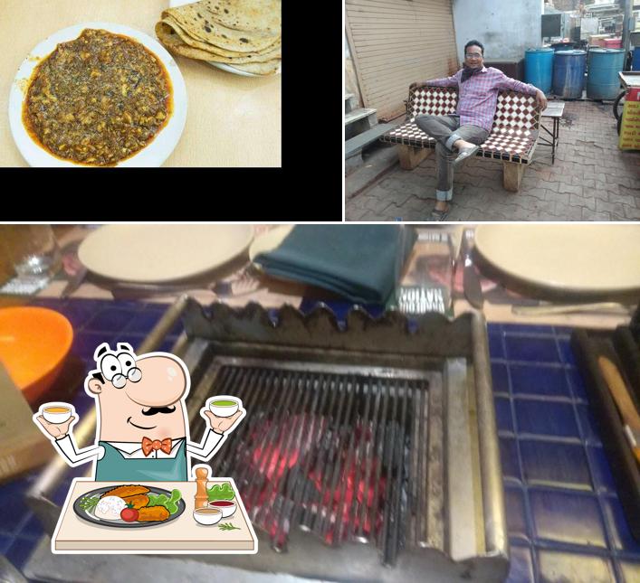 Check out the picture displaying food and interior at BHURA FRY CENTER
