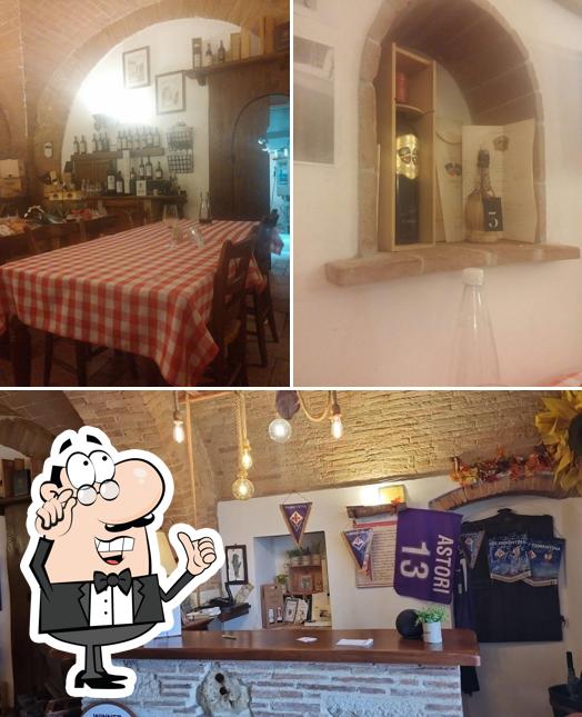 Dai un'occhiata agli interni di Osteria Il Sigillo: Locanda e B&B