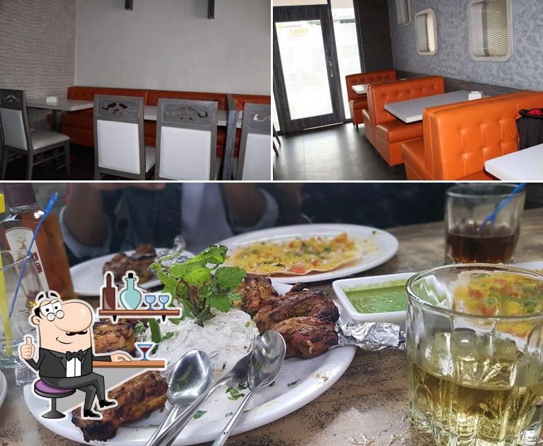 The image of interior and food at Aqua Garden - Family Resto Bar