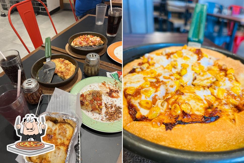 At Pizza Hut Ranipur Mor, Haridwar, you can try pizza
